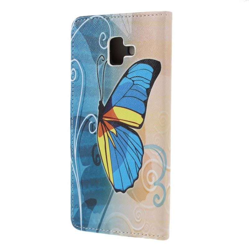 Läderskal Samsung Galaxy J6 Plus Ljusblå Fjärilar Och Blommor